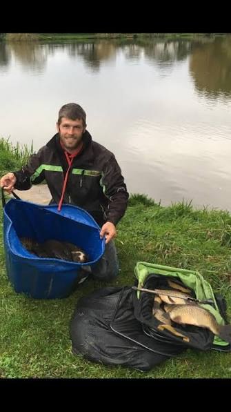 A younger Dale Shepherd holding a fish.